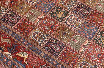 A Moud part silk carpet, 354 x 252 cm.