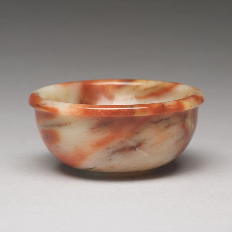 A sculptured stone bowl, China, early 20th Century.