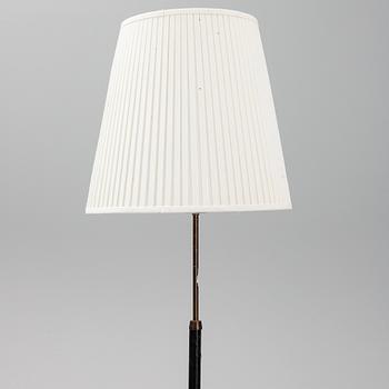 A '7071' floor lamp by Falkenbergs belysning.