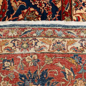 A carpet, semi-antique, Esfahan, ca 410 x 302 cm.