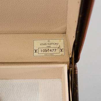 LOUIS VUITTON, a monogram canvas suitcase, "Alzer 75".