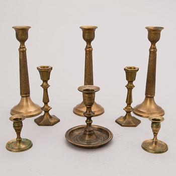 CANDLEHOLDERS, 8 pcs, different, brass and metal.