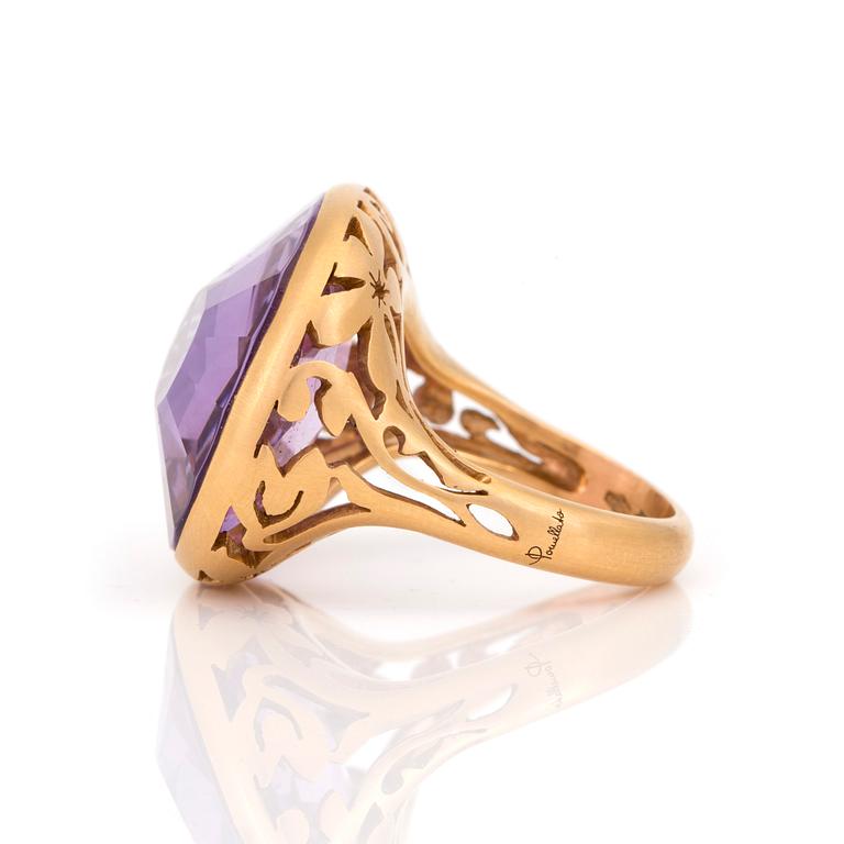 An 'Arabesque' ring by Pomellato set with an oval, mixed-cut amethyst.