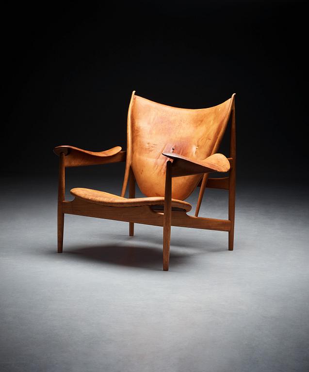 Finn Juhl, a teak and natural brown leather "Chieftain Chair" by Niels Vodder, 1950-60's.