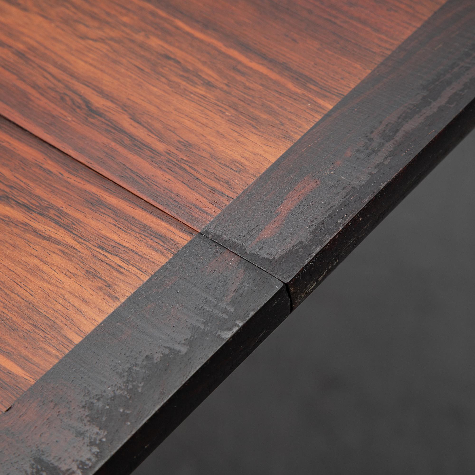 A seven-piece rosewood dining suite, 1960's/70's.