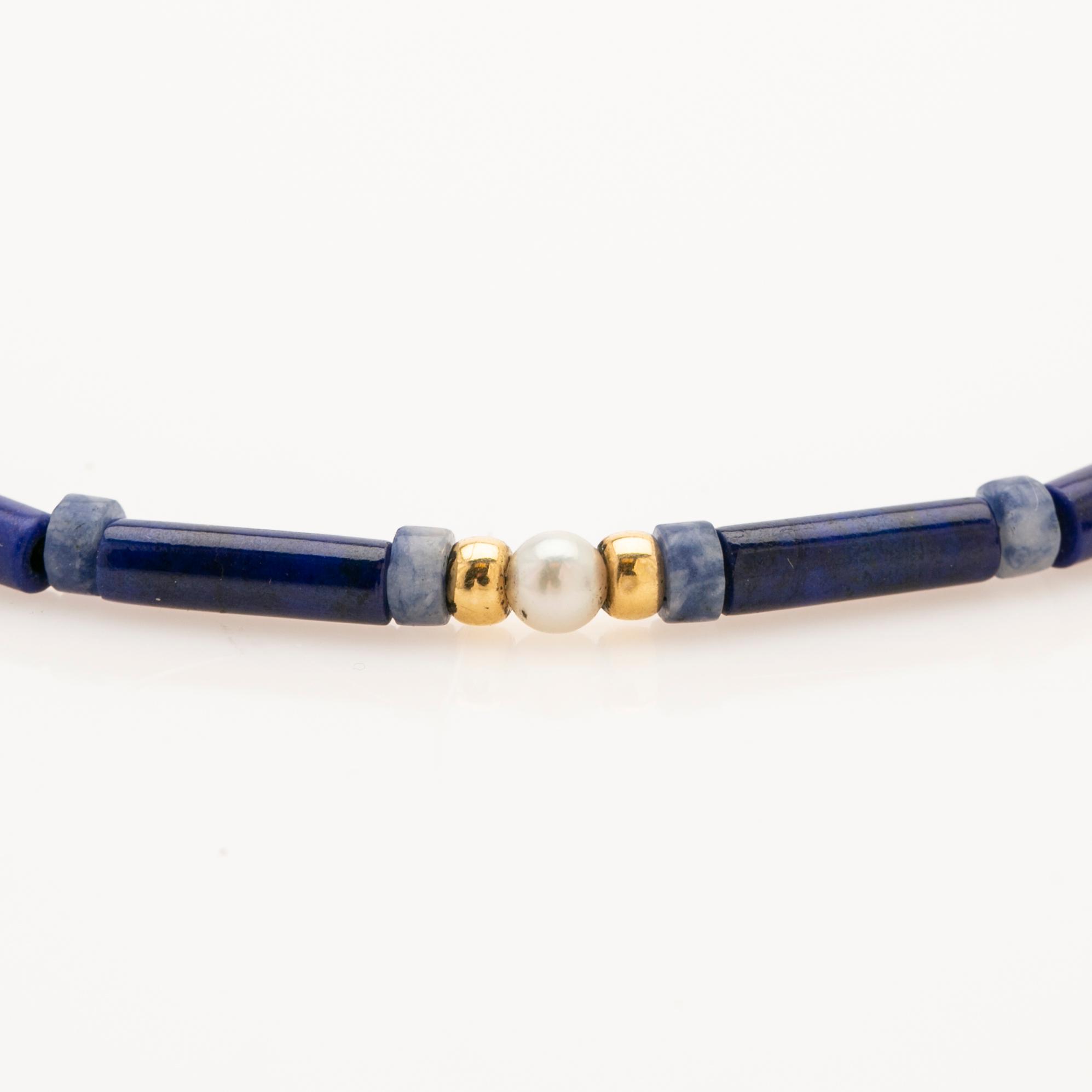 Necklace, lapis lazuli, gold and pearl.