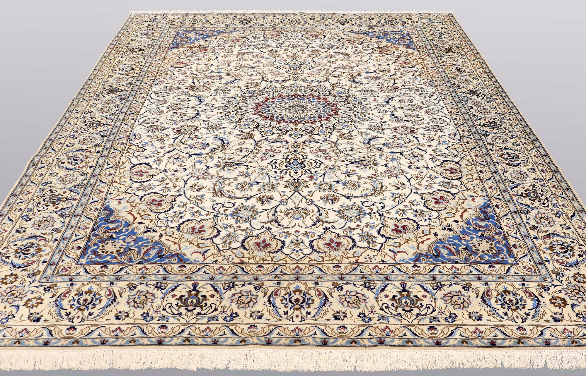 A carpet, Nain part silk, 364 x 256 cm.
