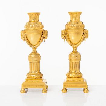 A pair of French Louis XVI style gilt-bronze casolettes, later part 18th century.