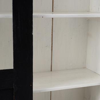 Display cabinet, circa 1900.