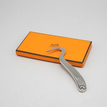 Hermès, hoof pick.