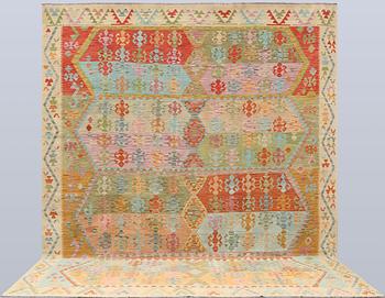 A Killim carpet, approx. 385 x 306 cm.