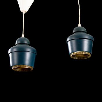 A pair of 'A330' ceiling lamps for Valaistustyö.