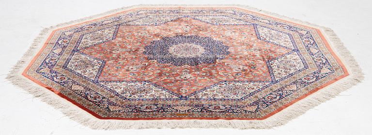 An Oktagonal  silk Qum rug, Central Persia, signed, c. 250 x 250 cm.
