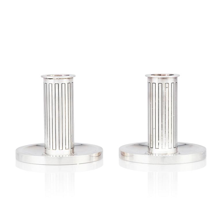 Sigvard Bernadotte, a pair of sterling candlesticks, Copenhagen 1945-1977, model nr 923.