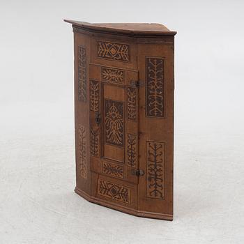 Corner cabinet, dated 1769.