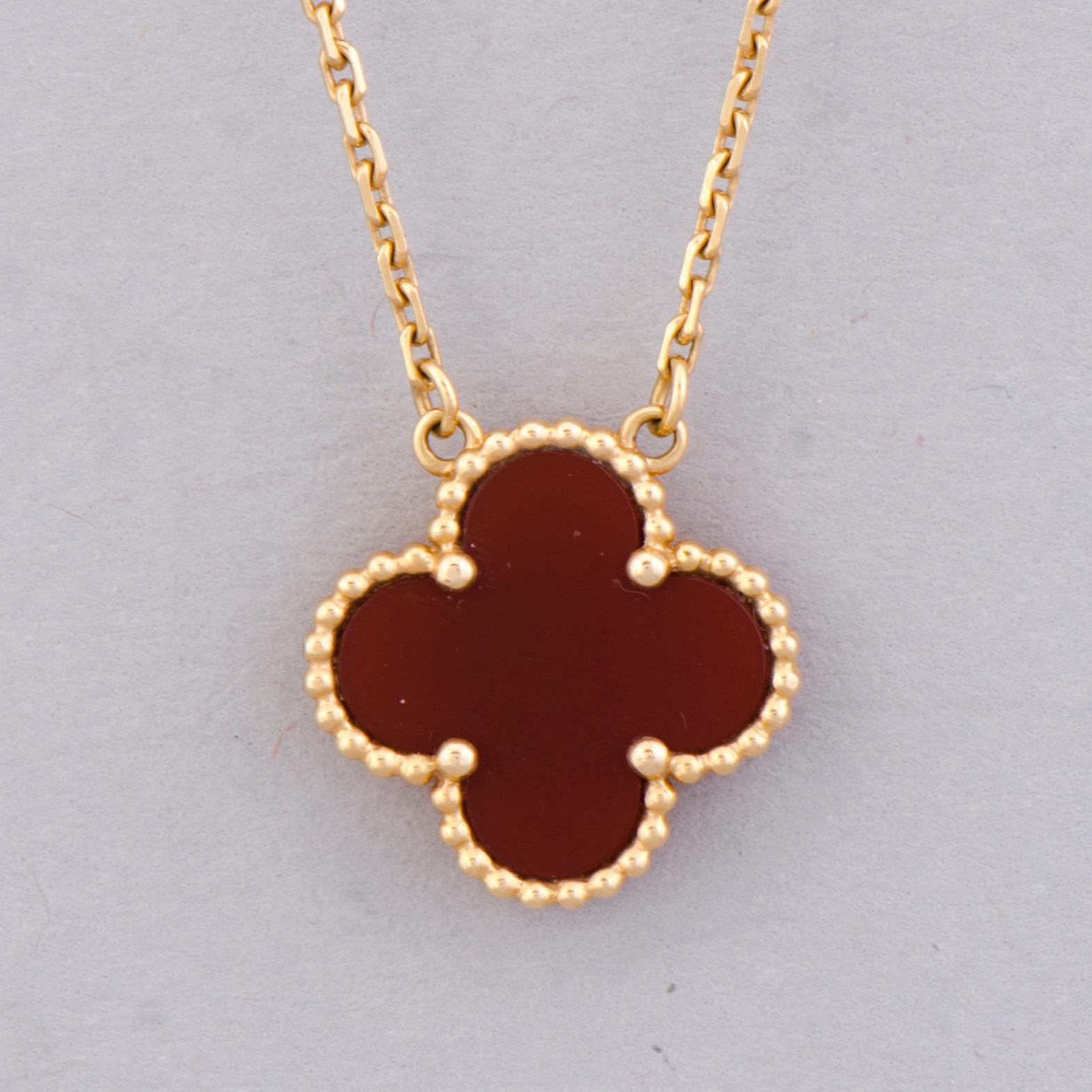 A VAN CLEEF & ARPELS NECKLACE, 'Alhambra'. 18K gold, carnelian.