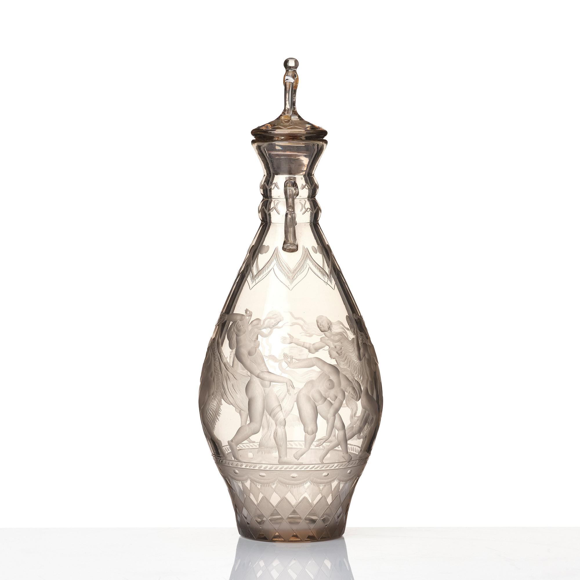 Simon Gate, an engraved glass decanter with stopper, Orrefors 1926, model 234.