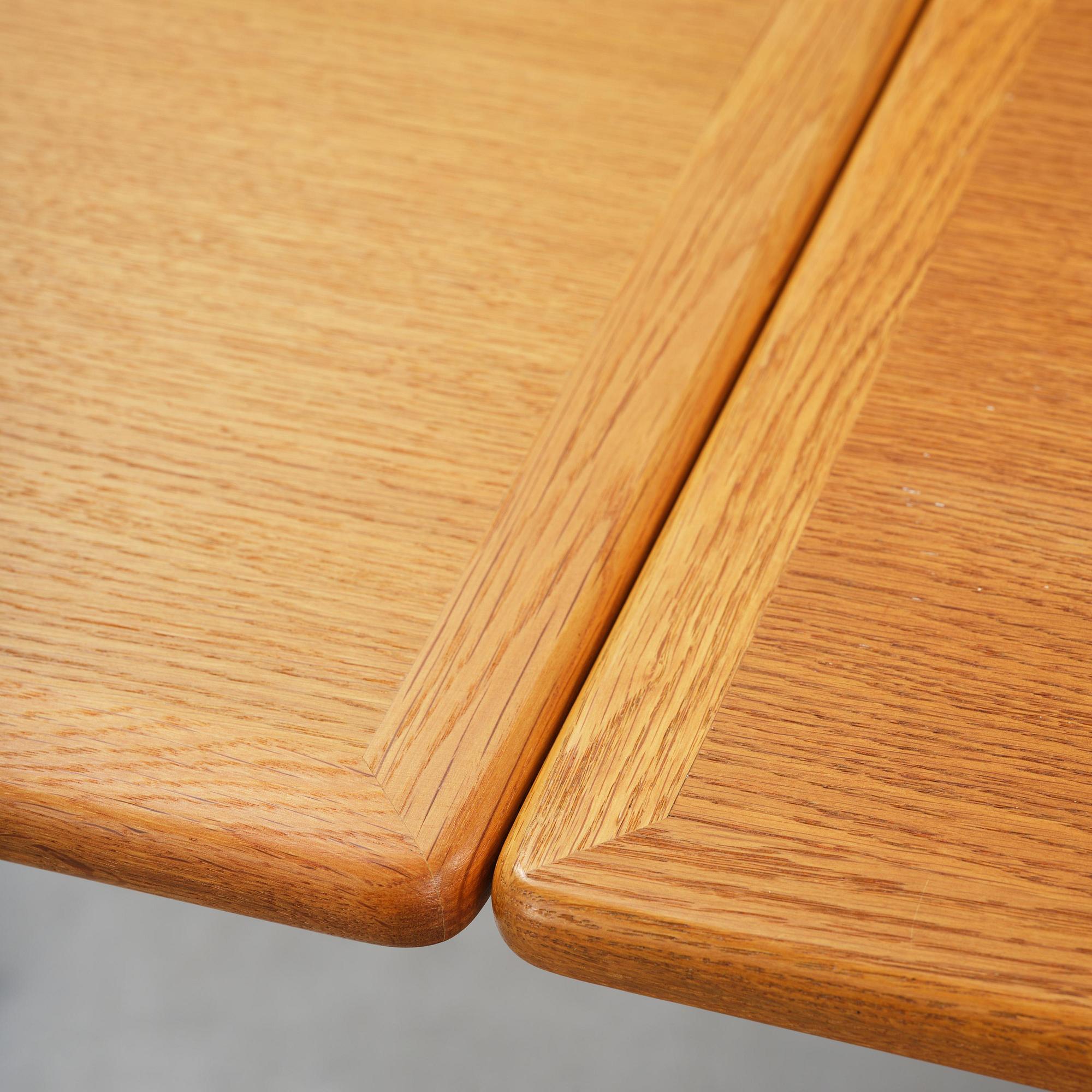 Hans J. Wegner, an "AT-312" dining table, Andreas Tuck, Denmark, 1950s-60s.