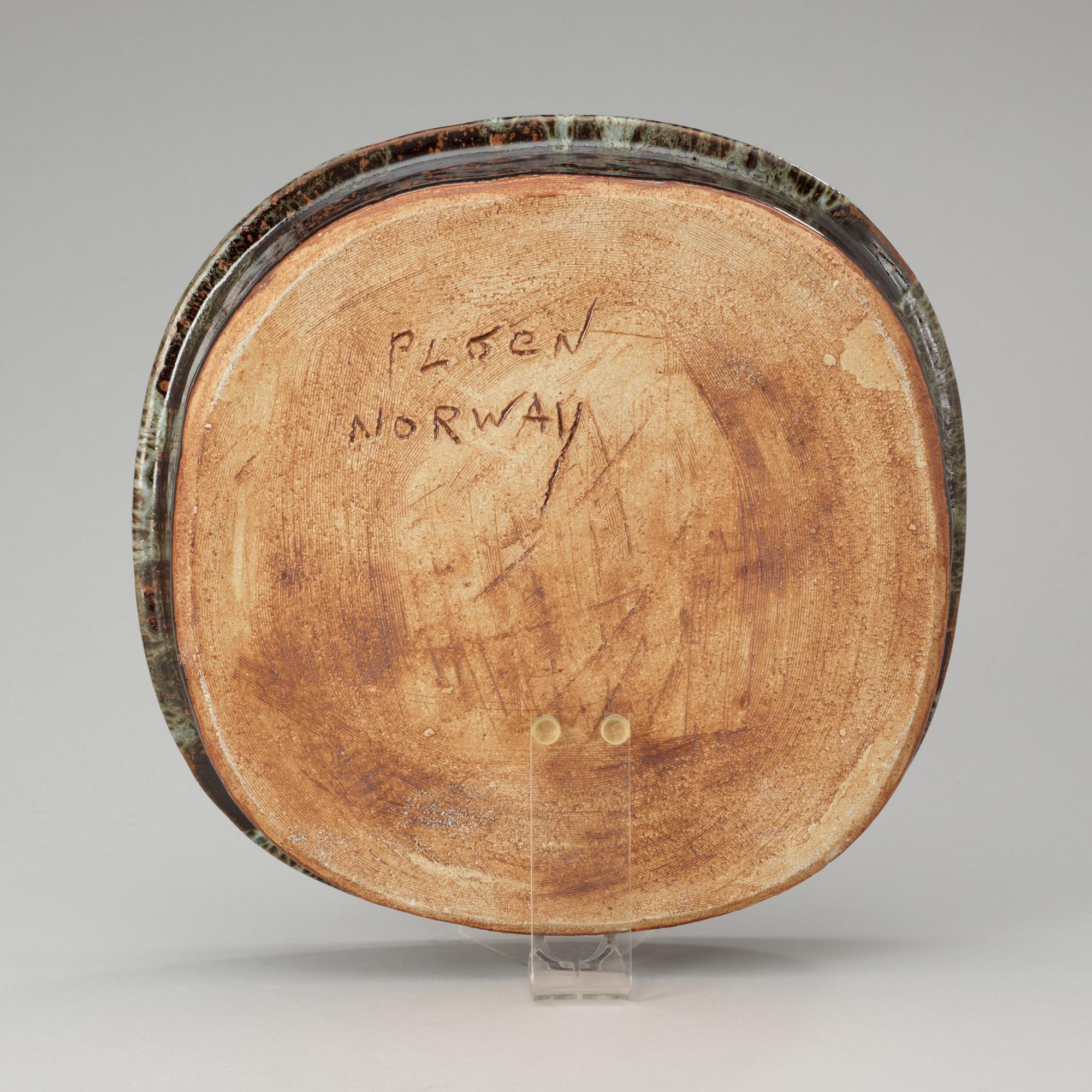 An Erik Pløen green and brown glazed stoneware dish, Norway.