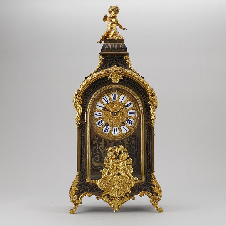 A boulle style table clock, circa 1900.