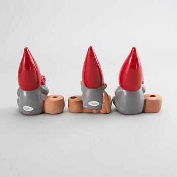 LISA LARSON, a set of three candle sticks.