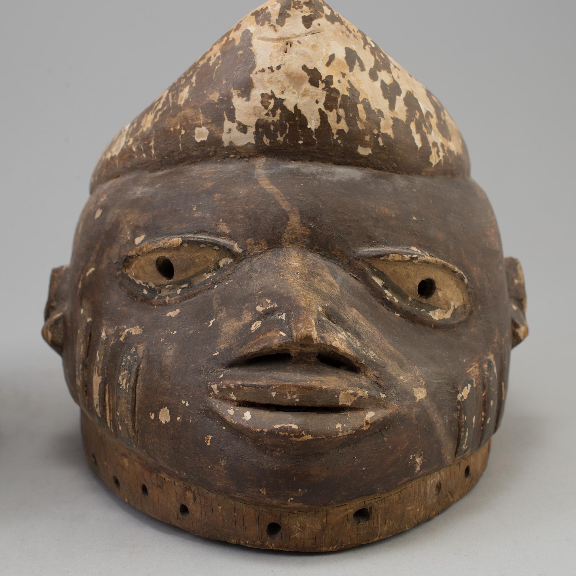 Two 20th century african wooden masks.