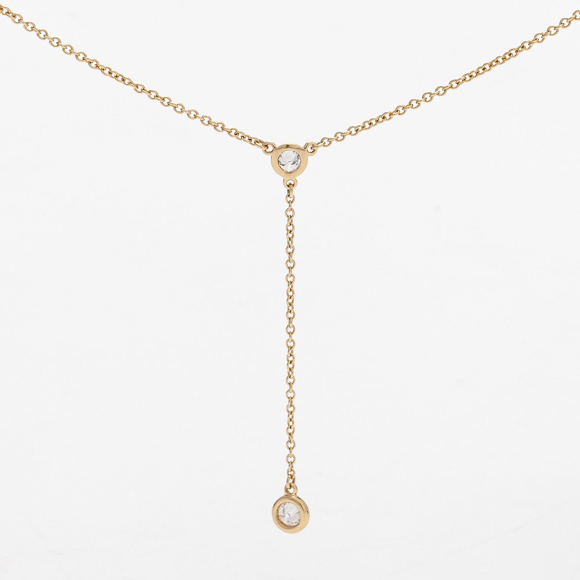 Tiffany & Co, Elsa Peretti, kaulakoru, "Diamonds by the Yard", 18K kultaa ja kaksi briljanttihiottua timanttia.