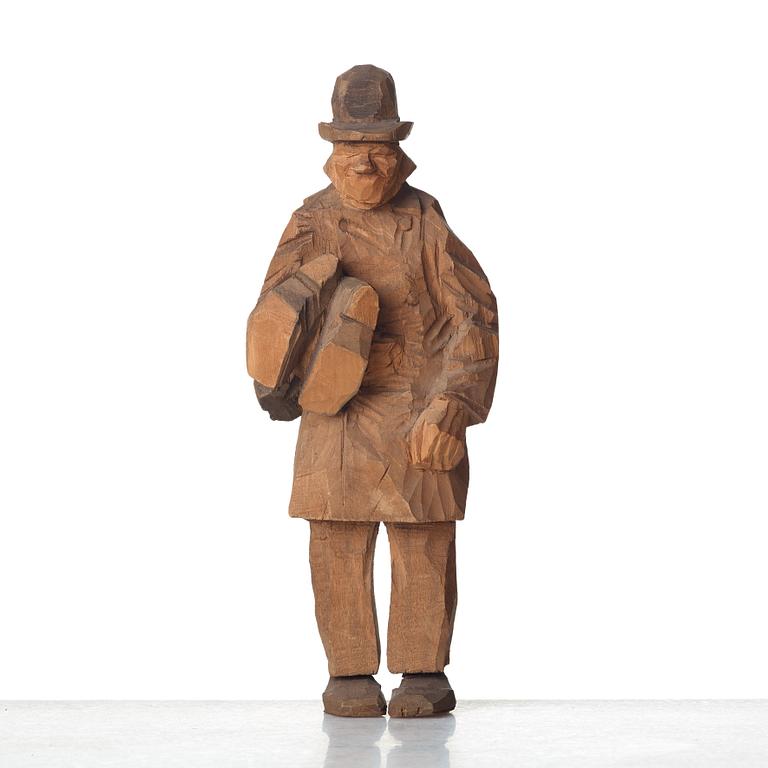 Axel Petersson Döderhultarn, Man holding boots.