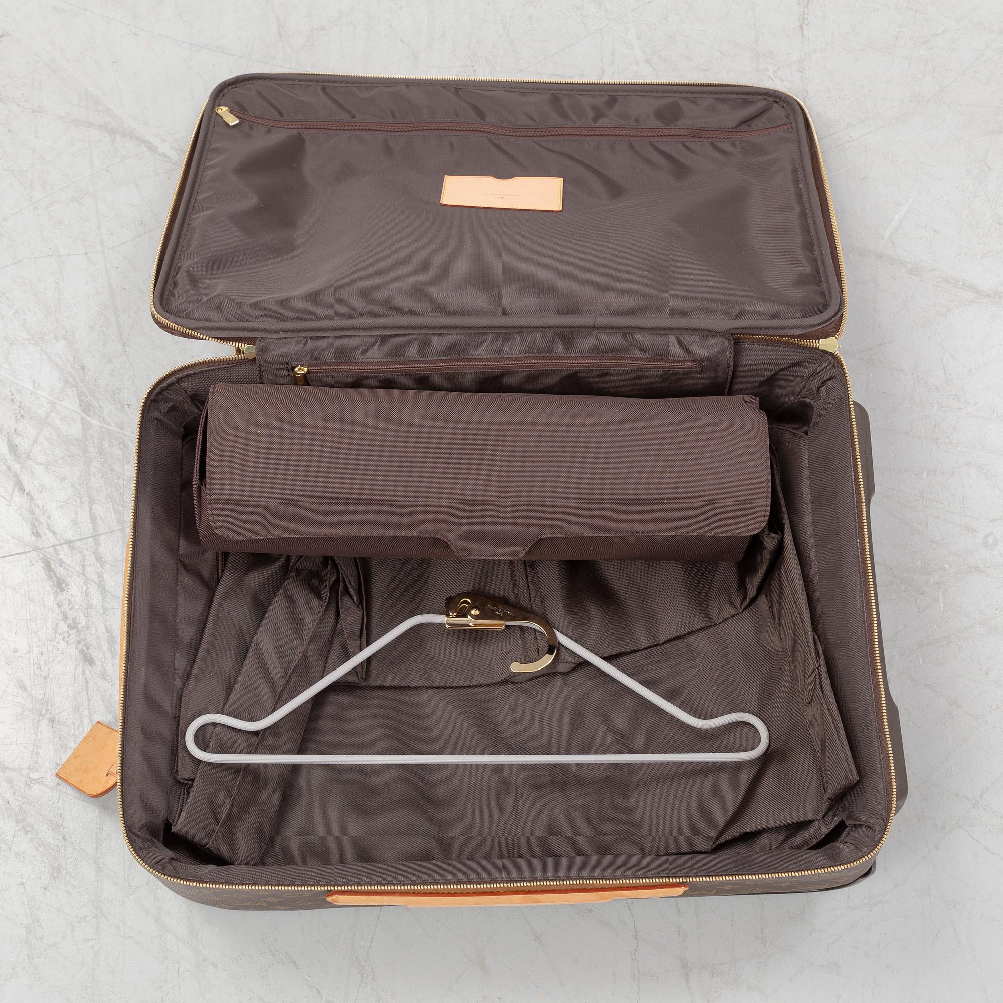Louis Vuitton, a monogram canvas 'Pegase 55' suitcase, 2009.