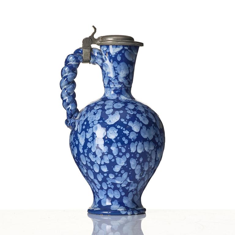 A French Nevers 'Bleu Persan' ewer with pewter cover, c. 1700.