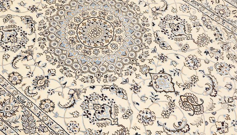 A Nain rug, part silk, so-called 9LAA, c. 210 x 130 cm.