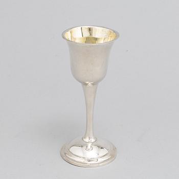 A Swedish 18th / 19th century silver beaker, cup and caster-spoon.