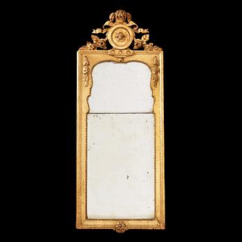 1229A. A Gustavian late 18th century mirror.