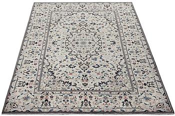 A Keshan carpet, c. 298 x 193 cm.