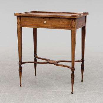 A circa 1800 table in the style of Lars Qvarnberg.