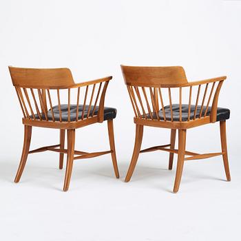 Josef Frank, a pair of mahogany and black leather 'Captain's chair', Svenskt Tenn, model 789B, acquired in 1950.