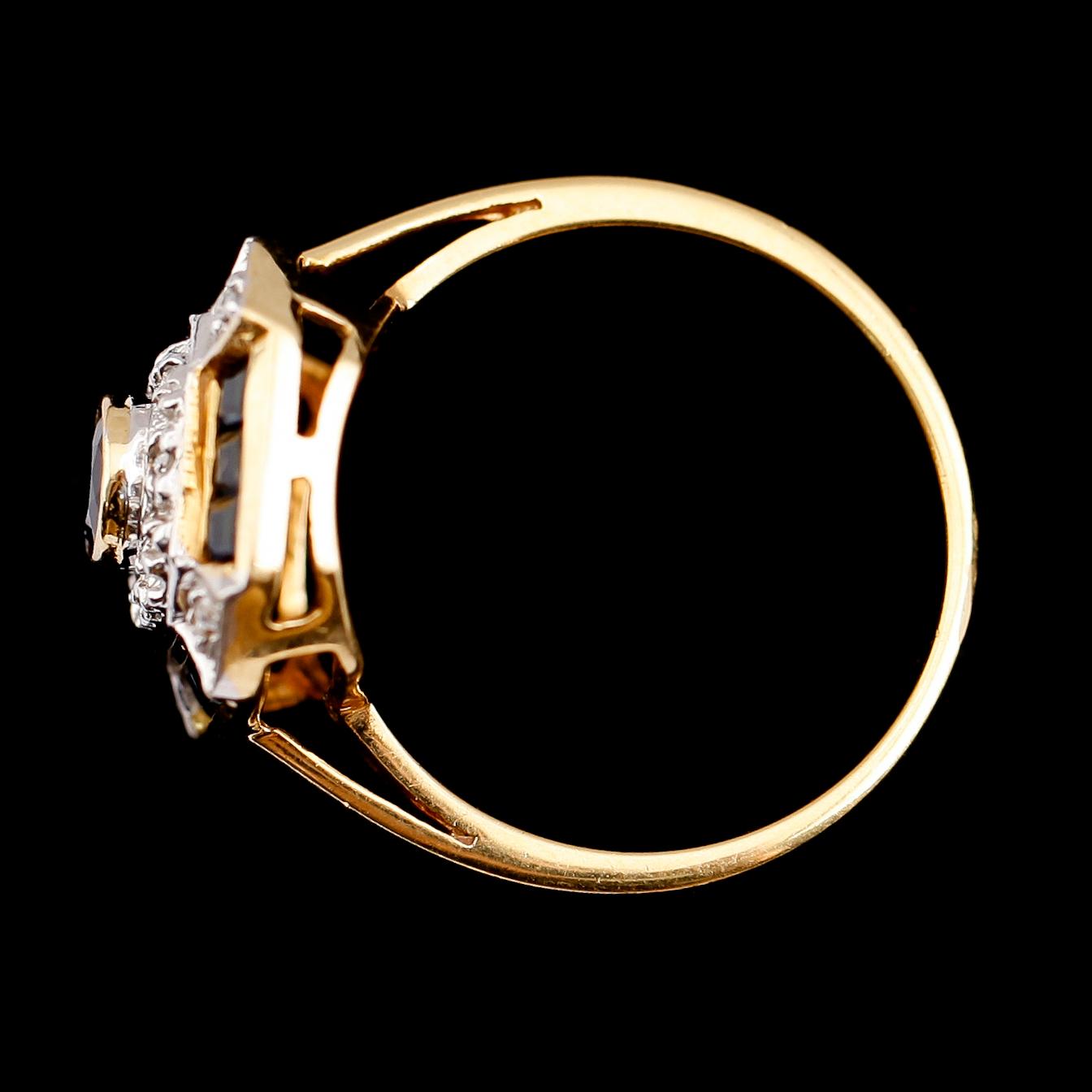 RING, 18 k guld, briljanter och safirer.