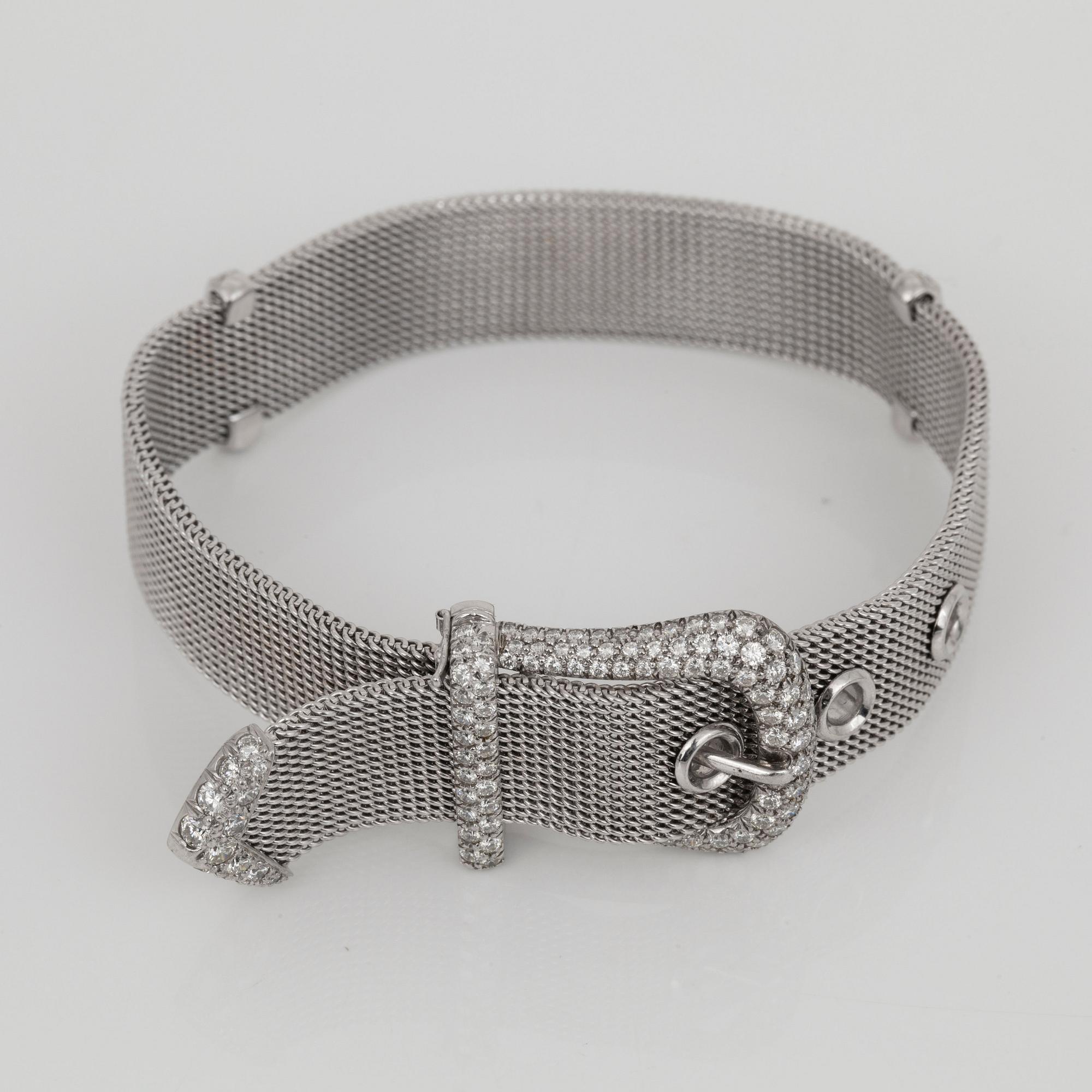 A Tiffany & Co brilliant-cut diamond bracelet in the shape of a belt. Total carat weight circa 3.00 cts.