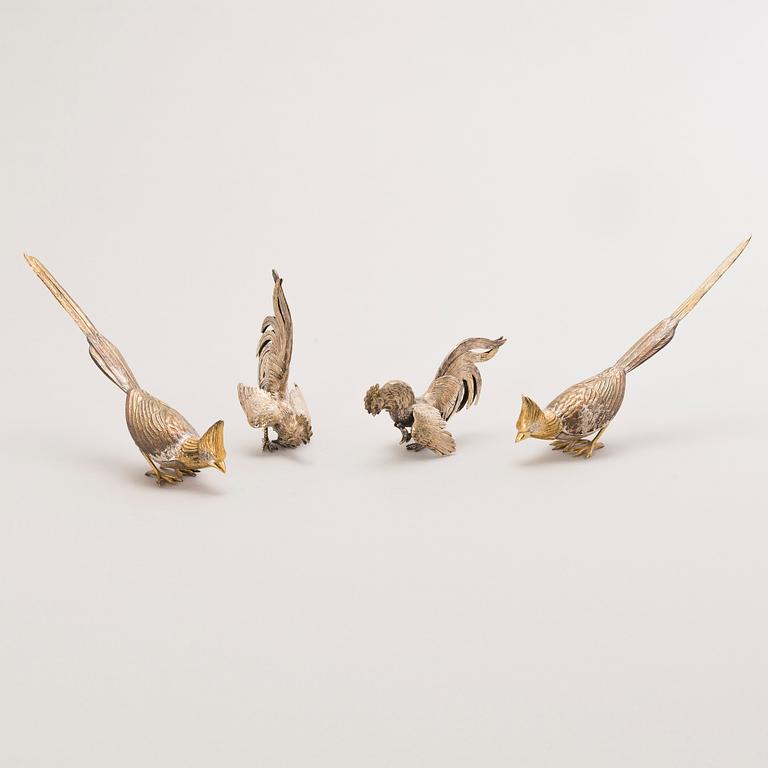 Four silver bird table decorations, Spanish and Finnish hallmarks, 20th Century.