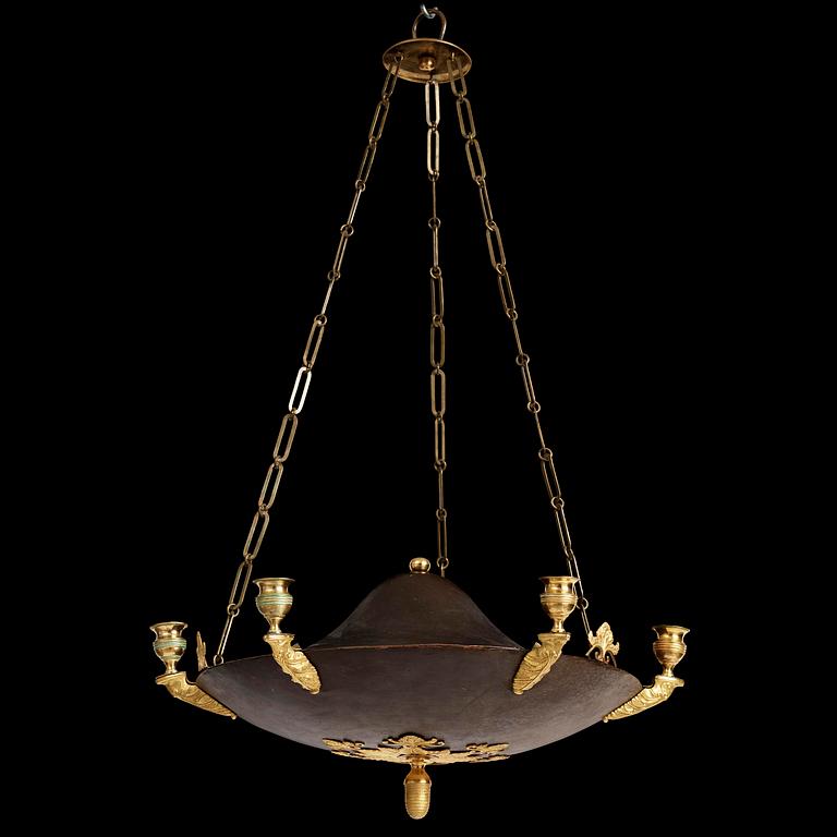 A Swedish Empire ormolu and tole six-branch chandelier, Stockholm, early 19th century.