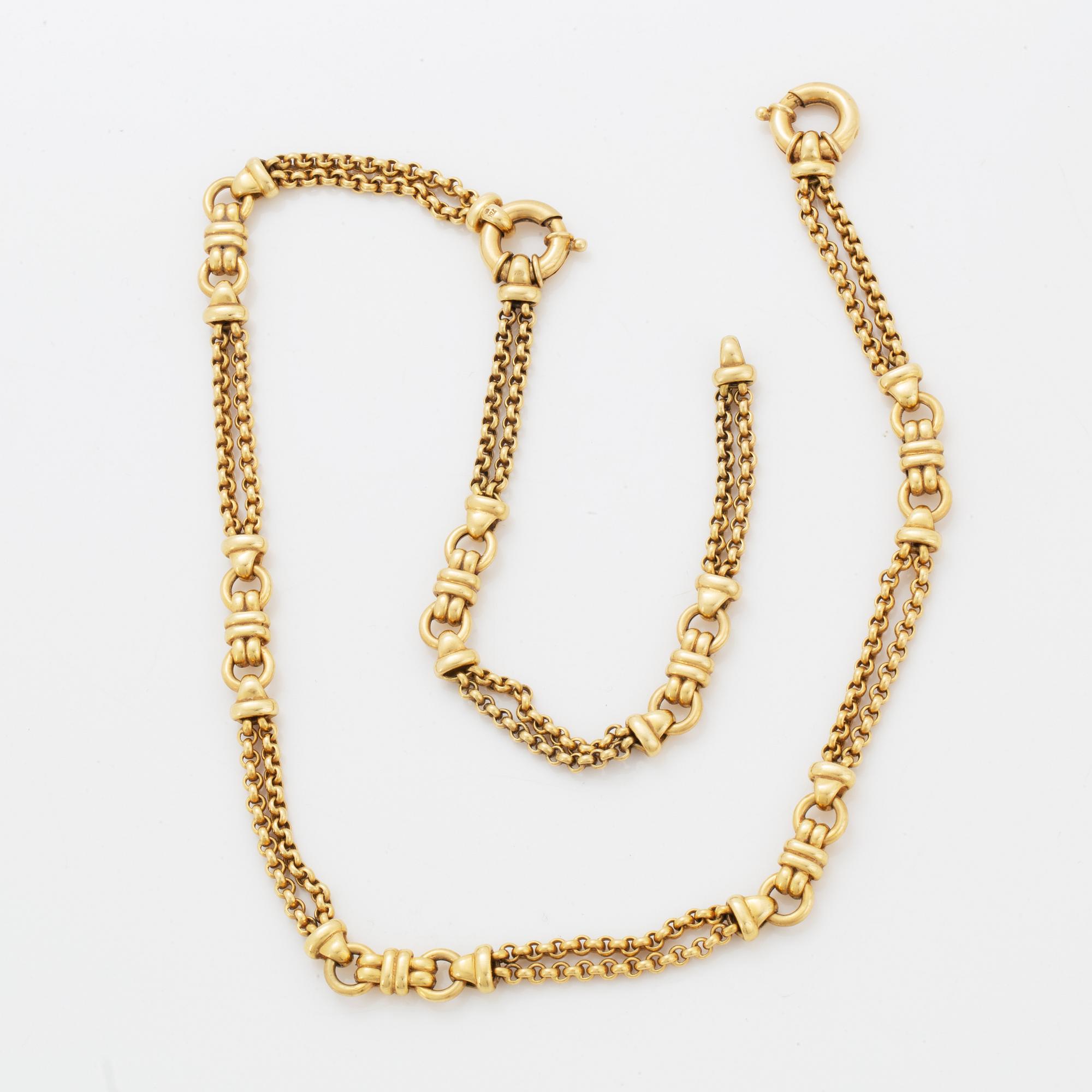 Halslänk/armband 18K guld.