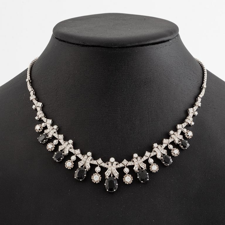 Necklace 18K white gold with step-cut sapphires and round and eight-cut diamonds.
