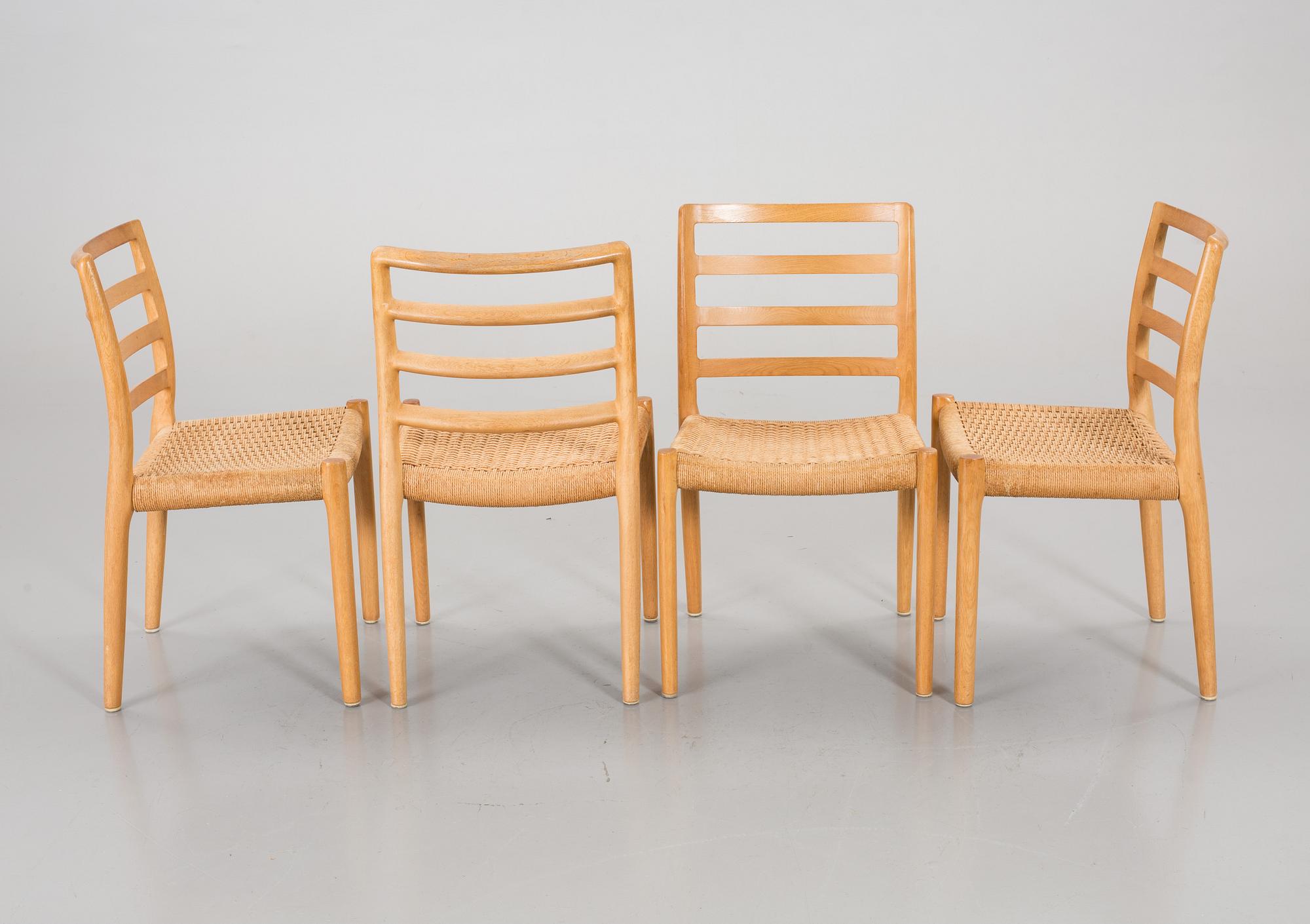 A SET OF 4 CHAIRS AND A TABLE BY Niels O Möller.
