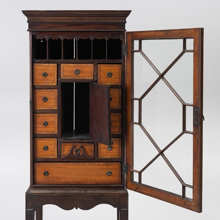 Display cabinet, likely England 19th century.