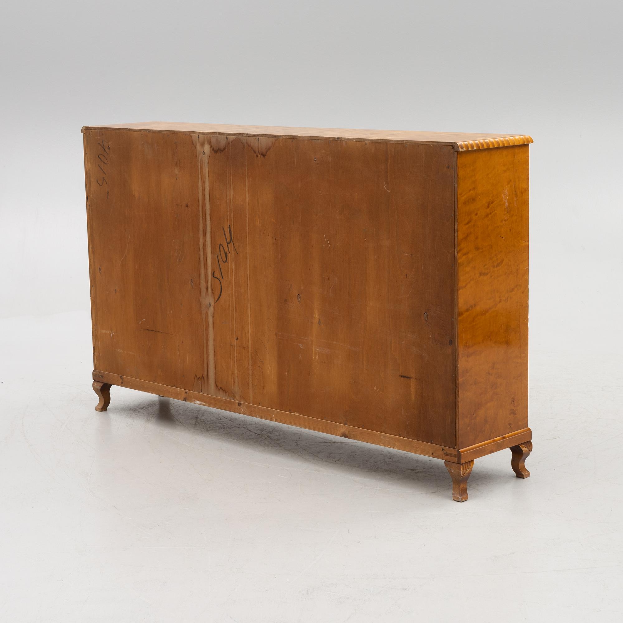 A bookcase with cabinet, 1940's.