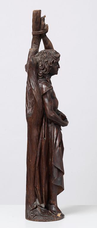 A wooden sculpture depicting St Sebastian, probably German, circa 1500.