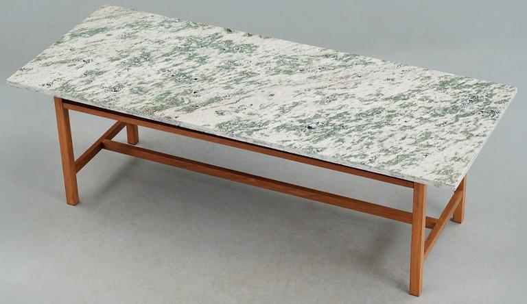 A Josef Frank mahogany and marbel top sofa table by Svenskt Tenn.