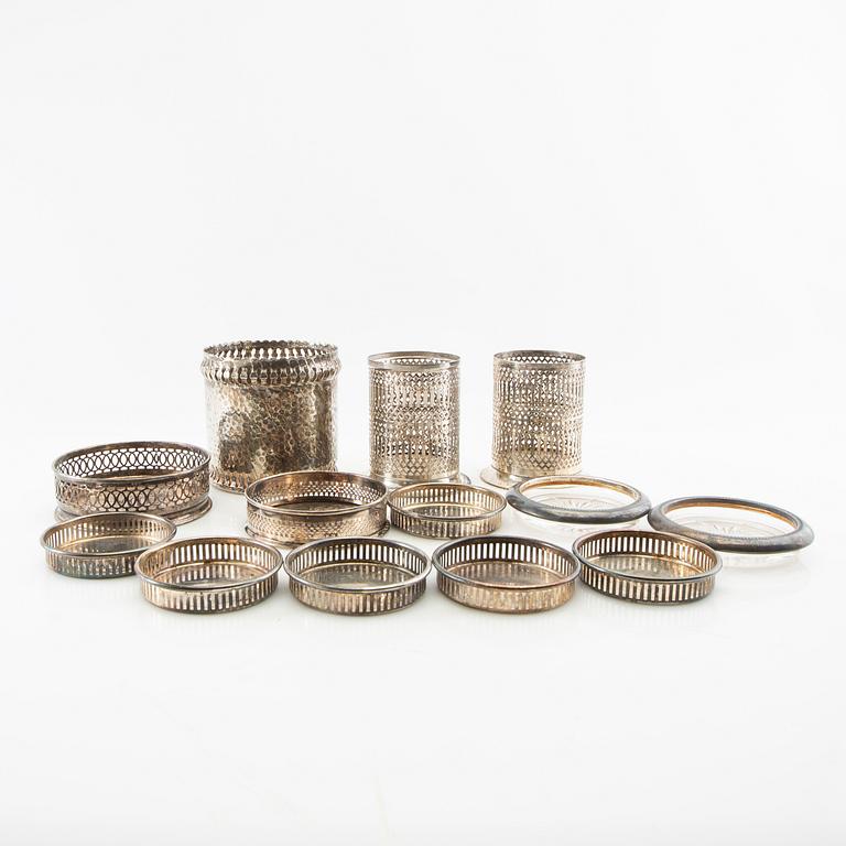 Coasters/Bottle holders 13 pcs first half of the 20th century, silver plate.