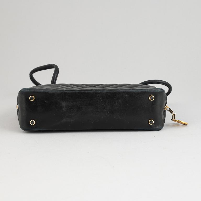 Chanel, a black leather handbag, 1980's.