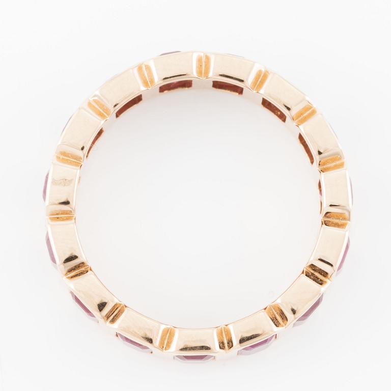 Ring, full eternity, 18K gold with rubies.